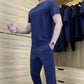 Zweiteiliges Sportset für Herren mit Kurzarmshirt und Hose